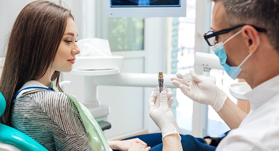 dentist explaining dental implants during a consultation